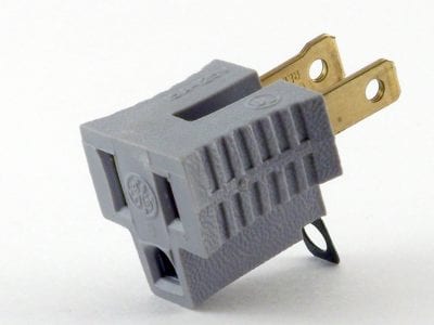 Three prong adaptor for a two prong electrical outlet are unsafe